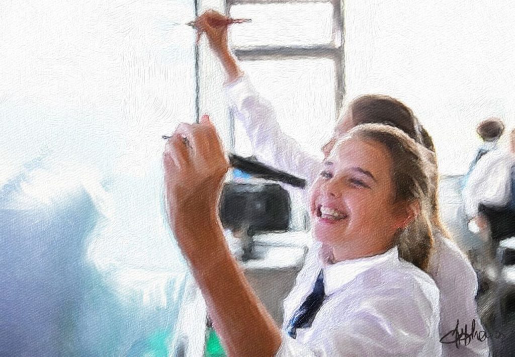 Pupils writing on a whiteboard